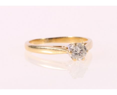 18ct gold diamond solitaire ring, the diamond approx. 4.5mm or 0.33ct, size J/K.