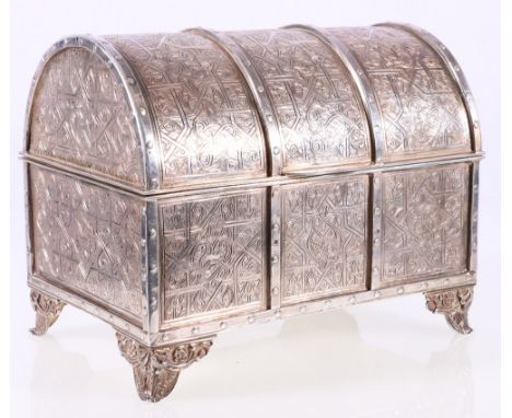 Egyptian / Turkish white metal domed top jewellery casket, each panel decorated with incised scrolling decoration and bears p