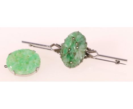 Chinese jade and white 9ct gold bar brooch with central carved and pierced oval jade panel depicting fruit, flanked by an Art