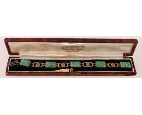 Chinese bracelet in white 9ct gold with five claw set, pierced and carved jade flower panels, interspersed with yellow and wh