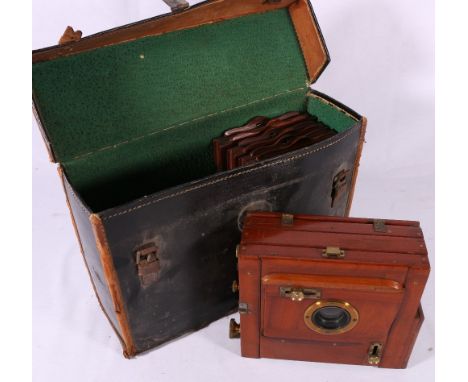 Early 20th century glass plate camera with accessories including tripod mount, time shutter by Thornton-Pickard, with travel 