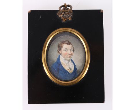 19th CENTURY SCHOOL Bust length Portrait miniature of a gentleman in a blue jacket and cravat Unsigned, watercolour perhaps o