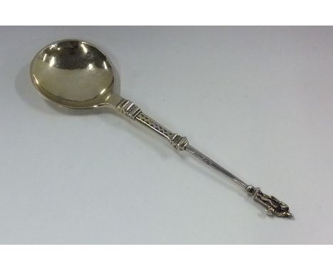 A silver gilt anointing spoon with tapering handle. Approx. 61 grams. Est. £30 - £50.
