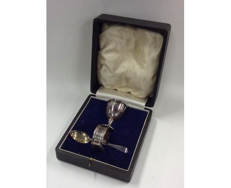A cased silver three piece christening set. Approx. 44 grams. Est. £40 - £60.