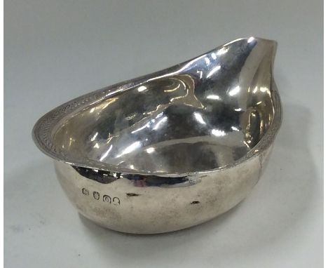 A Georgian silver toddy ladle with bright cut decoration. London. Approx. 45 grams. Est. £80 - £120.