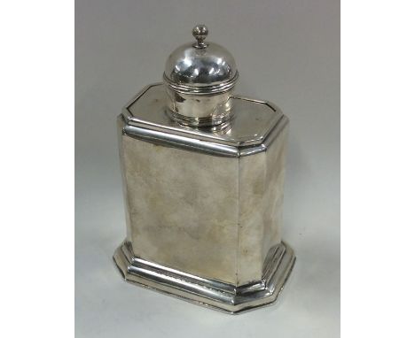 A George I silver caddy with cut corners and sliding top. London 1727. Approx. 190 grams. Est. £600 - £800.