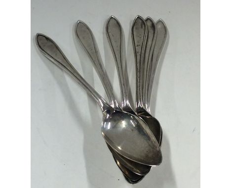 A heavy set of six silver grapefruit spoons. Sheffield. By EV. Approx. 163 grams. Est. £30 - £50.