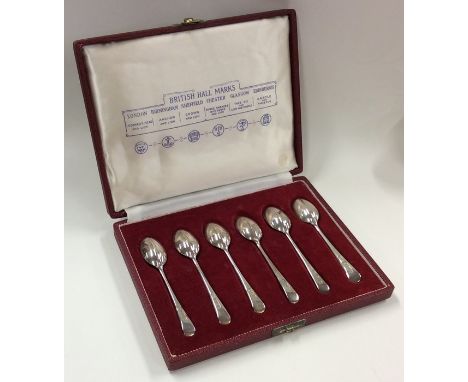 A cased set of six rat tail silver teaspoons. Approx. 77 grams. Est. £35 - £45.