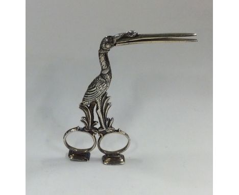 A good pair of Victorian silver cast scissors in the form of a stork with textured body. Approx. 48 grams. Est. £150 - £200.