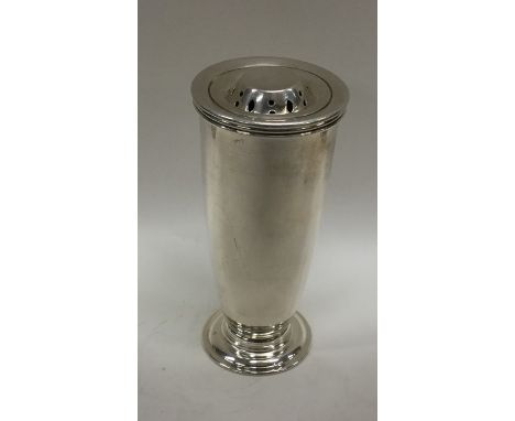 A stylish silver tapering sugar caster on spreading base. Approx. 125 grams. Est. £60 - £80.