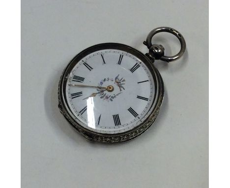 A small Continental silver fob watch with white enamel dial. Est. £10 - £20.