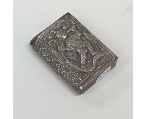 A heavy Indian silver vesta case embossed with figures. Approx. 36 grams. Est. £20 - £30.