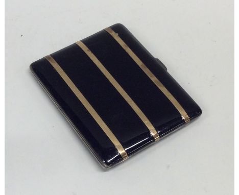 A good quality silver, enamel gold overlaid cigarette box with gilt interior. Approx. 88 grams. Est. £30 - £40.