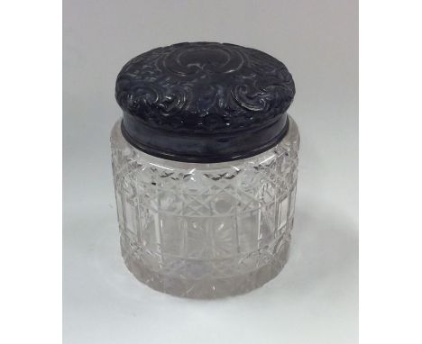 An Edwardian silver hobnail cut dressing table jar. Birmingham. Est. £20 - £30.