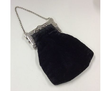 A good quality 18th Century Dutch silver purse with swag decoration. Approx. 120 grams. Est. £200 - £300.