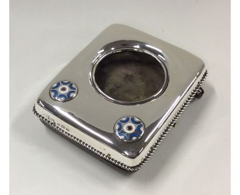 LIBERTY &amp; CO: A silver and enamel watch case with gadroon rim. Approx. 76 grams. Est. £180 - £220.