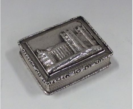 A good quality large castle top silver vinaigrette with gilt interior decorated with flowers and scrolls. Birmingham. By FS. 