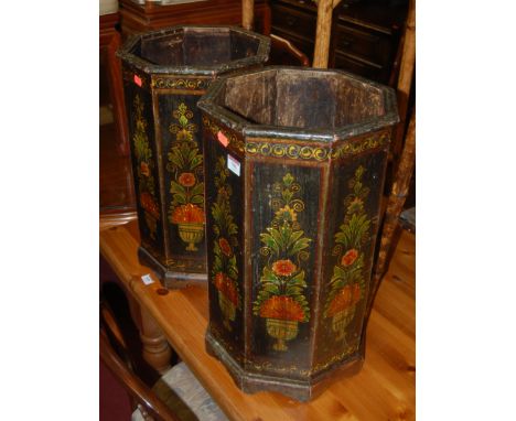 A pair of octagonal painted wooden stick stands