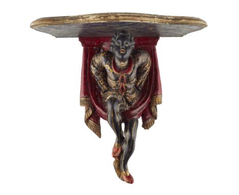 VENETIAN POLYCHROME CARVED BLACKAMOOR WALL BRACKET20TH CENTURY with a serpentine platform, above a figure suspended by carved