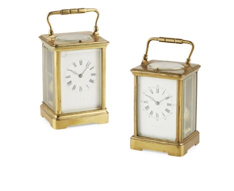 TWO FRENCH GILT BRASS REPEATING CARRIAGE CLOCKSLATE 19TH/ EARLY 20TH CENTURY each corniche case enclosing a white enamel Roma