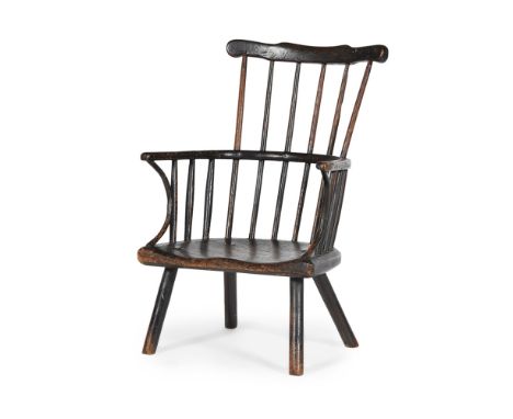 STAINED ELM AND ASH COMB-BACK CHILD'S ARMCHAIREARLY 19TH CENTURY the shaped top rail above a spindle back and U shaped arms o