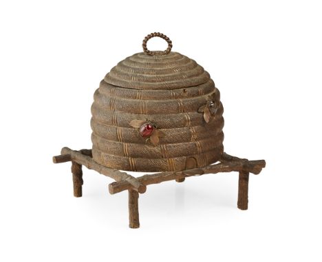 ENGLISH GILT BRASS BEEHIVE SEWING BOX19TH CENTURY in the form of a bee skep, with a hinged lid and twist loop handle, the sid