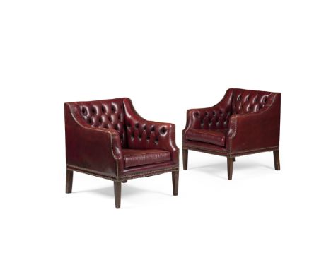 PAIR OF REGENCY STYLE OXBLOOD LEATHER ARMCHAIRSMID 20TH CENTURY the low square button upholstered back and sloped enclosed ar
