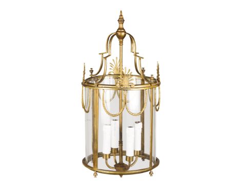 SMALL NEOCLASSICAL BRASS HALL LANTERNEARLY 20TH CENTURY the circular brass frame mounted with anthemion and rope swags, enclo
