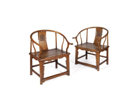 PAIR OF CHINESE NORTHERN ELM (YUMU) HORSESHOE BACK ARMCHAIRS19TH CENTURY the crest rail ending in scroll hand grips, above ba