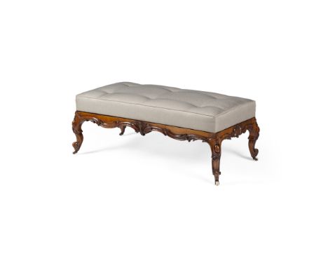 VICTORIAN ROSEWOOD FRAMED CENTRE STOOLMID 19TH CENTURY the button upholstered rectangular top above foliate and C scroll carv