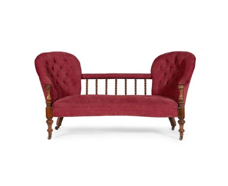 VICTORIAN WALNUT FRAMED DOUBLE CHAIRBACK SETTEE19TH CENTURY the double buttoned back flanking bobbin turned supports over a s