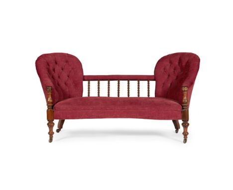 VICTORIAN WALNUT FRAMED DOUBLE CHAIRBACK SETTEE19TH CENTURY the double buttoned back flanking bobbin turned supports over a s