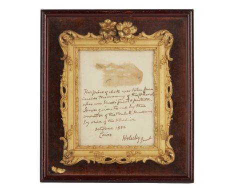 OF GARNET WOLSELEY (1ST VISCOUNT WOLSELEY) INTERESTFRAMED PIECE OF MUMMY CLOTH, DATED 1882 in a giltwood and shadow box frame