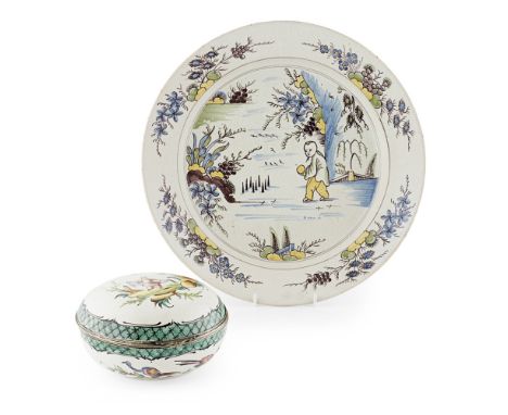 FRENCH FAIENCE POLYCHROME CHARGER, ATTRIBUTED TO SAINT AMAND18TH CENTURY painted with a Chinese boy playing skittles, in yell