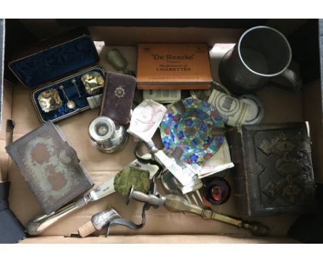 A box of mixed items to include a silver candle stick and a cased set of salts.  