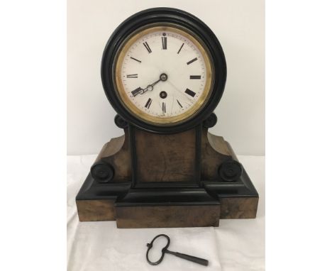 A vintage wooden cased Kleyser & Co mantel clock complete with key. In working order. Some damage to enamelling on clock face