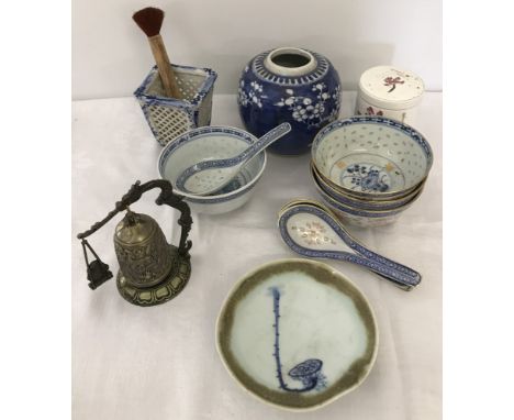 A collection of oriental pieces . To include blue and white cricket pot, Posy bowl and tea caddy. 