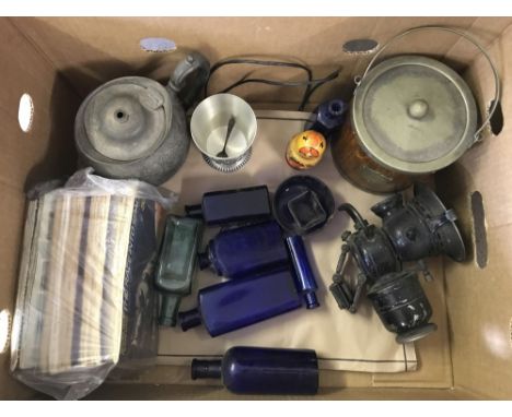 A box of assorted misc items. To include Brooke Bond tea cards and albums, vintage cycle lamp and a collection of Bristol blu