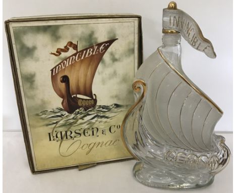 A boxed Larsen & Co Cognac 'Invincible' Viking ship glass decanter. Gilt highlights. Approx 30.5 cm tall.