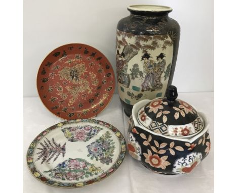 A large oriental Satsuma vase with hand painted detail to panels depicting geisha scenes. Together with an ceramic Chinese st