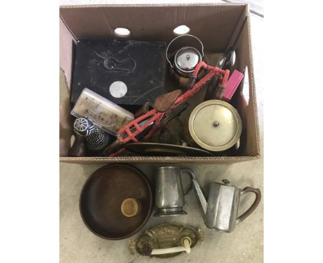 A collection of wooden and metal ware items. To include Vintage first aid tin, Tudric pewter coffee pot, brass charger set wi