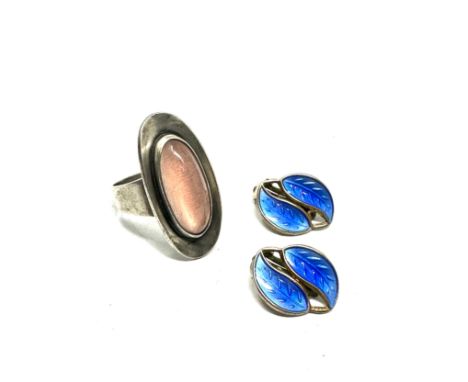 A silver ring by N E From, Denmark, and a pair of clip on earrings by david Anderson, Norway (10g) 