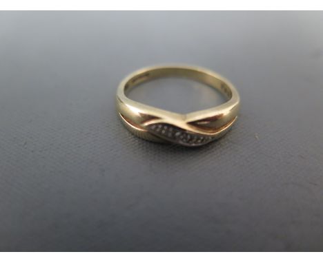 A 9ct yellow gold and single diamond ring size L - approx weight 1.9 grams - clean and bright