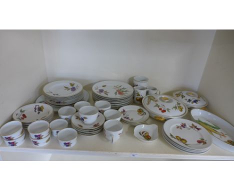 A part dinner service - Worcester Evesham pattern - approx 50 pieces including tureens, dinner plates, bowls, ramekins etc