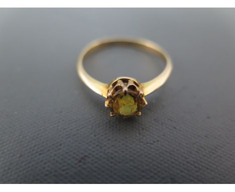 A 15ct yellow gold and yellow sapphire ring size L - approx weight 1.9 grams - minor usage wear