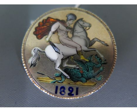 An enamel Crown coin brooch dated 1821