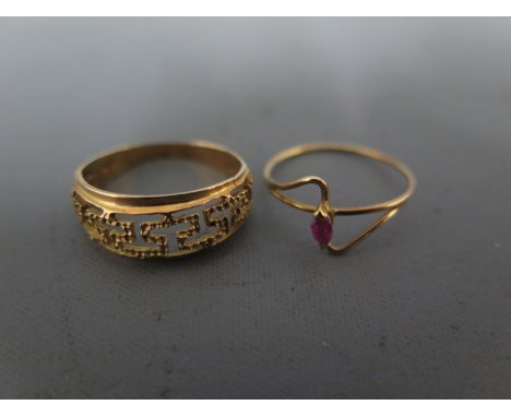 A 14ct yellow gold ring and a slender 9ct yellow gold ring, size O & M - Weight approx. 1.9gms & 0.9gms respectively Conditio