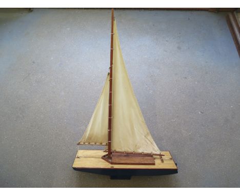A large vintage pond yacht with compartment for engine - Height 105cm x  62cm x 19cm Condition report: In playworn condition