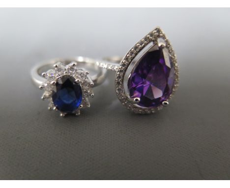 A sterling silver tear shaped amethyst dress ring and another silver dress ring - sizes N & L respectively