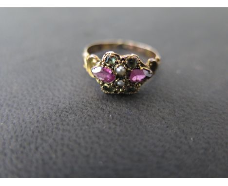 A 15ct rose gold ring set with pearls, red and green stones ring size  H - approx weight 1.5 grams - ring has been altered